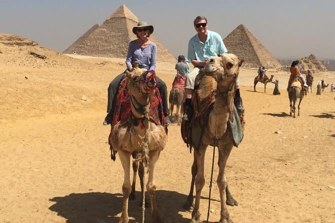 Giza Pyramids and Sphinx Half Day Tour Included Camel Ride