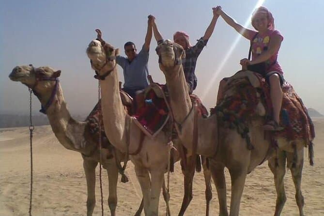 Sunrise or Sunset at Giza pyramids by horse or camel