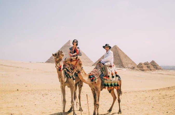 Guide on site Day Tour to Giza Pyramids By Camel from Cairo