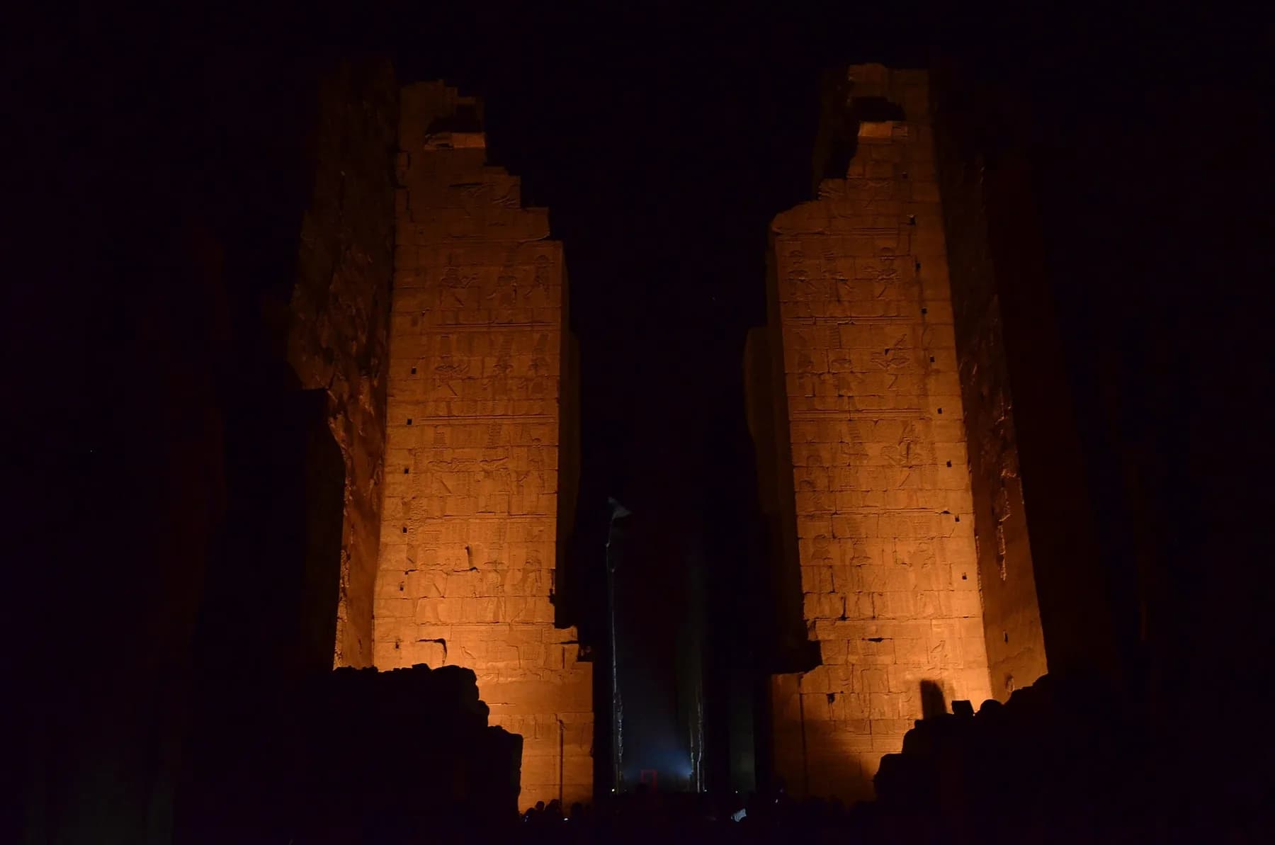 Pylon of the Temple of Amun lit in amber during the Sound and Light show