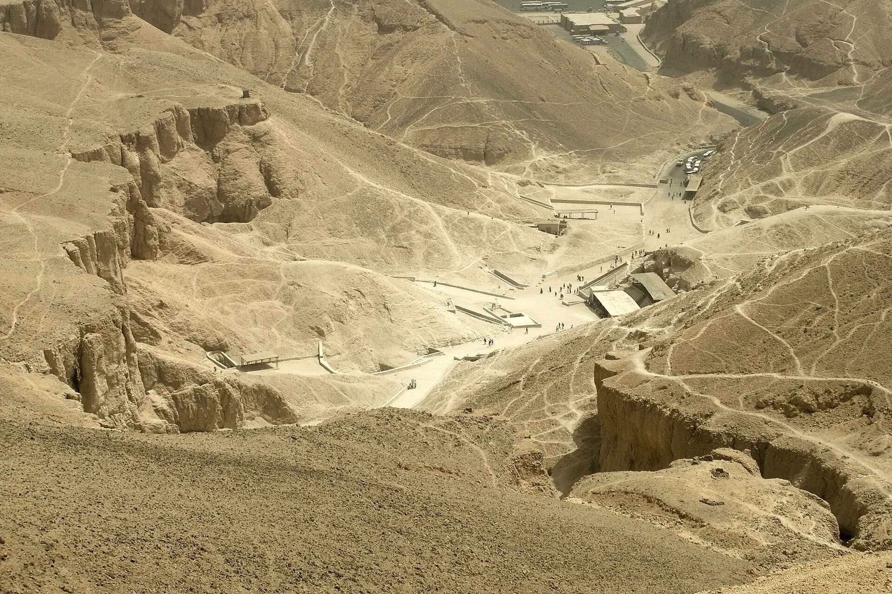 The Valley of the Kings seen from the hills above, with the visitor paths and tomb entrances on the valley floor