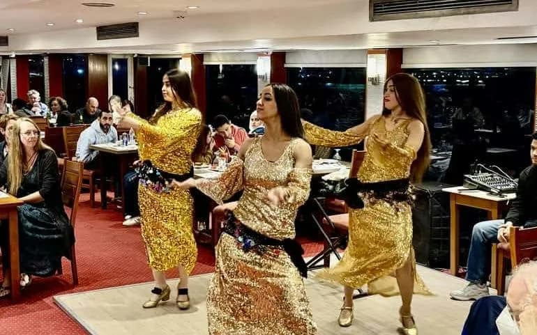 Cairo Nile Dinner Cruise with Buffet, Live Belly Dance, Tanoura Show, and Hotel Transfers