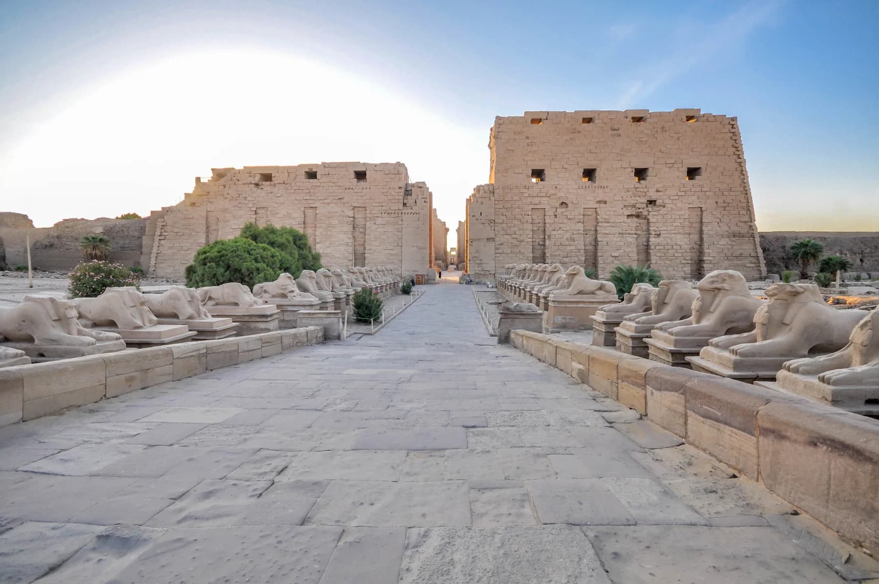 Empty avenue of ram-headed sphinxes leading to Karnak first pylon