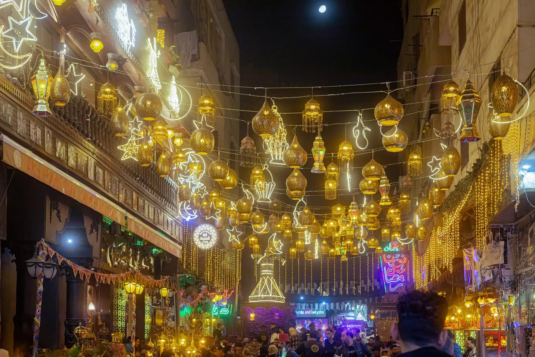 Ramadan lanterns and lights strung over Al Moez Street at night