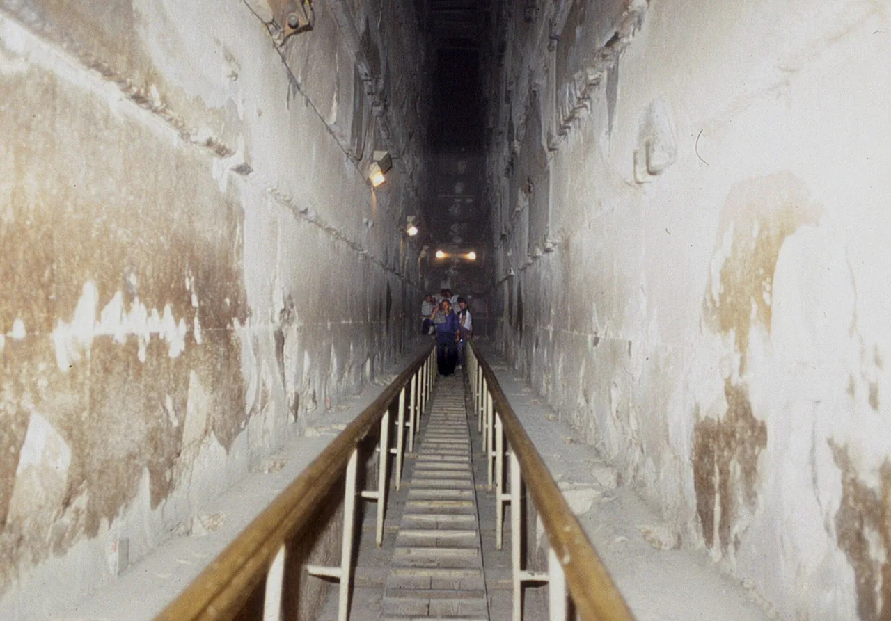 The wooden walkway climbing the Grand Gallery inside the Great Pyramid